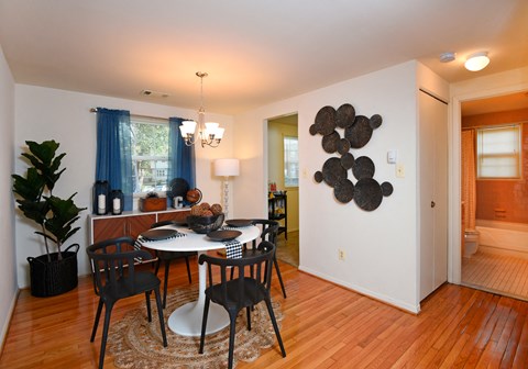 Dining room with hardwood flooring at Colony Hill Apartments & Townhomes, Baltimore, 21227