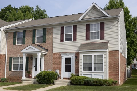 Exterior view of front of townhomes at Carlson Woods Townhomes, Baltimore, MD, 21244