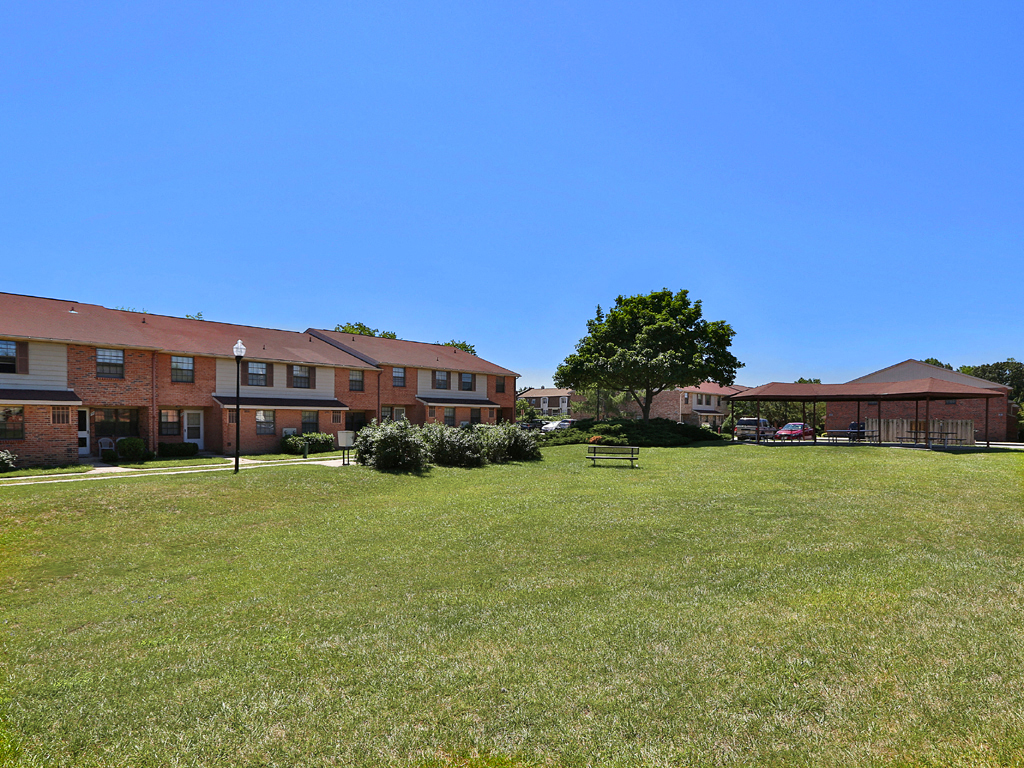 Property Exterior Lawn at Chapel Valley Townhomes, Baltimore, MD