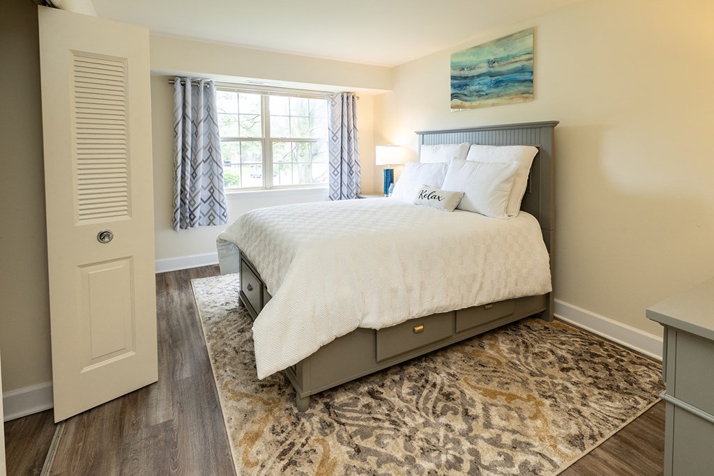 Guest Bedroom with window at Woodridge Apartments in Randallstown, MD 21133