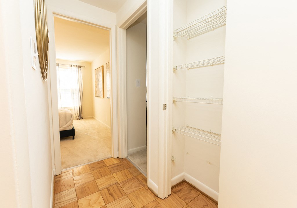 Upstairs hallway with ample storage at Spring Hill Apartments & Townhomes, Baltimore Maryland