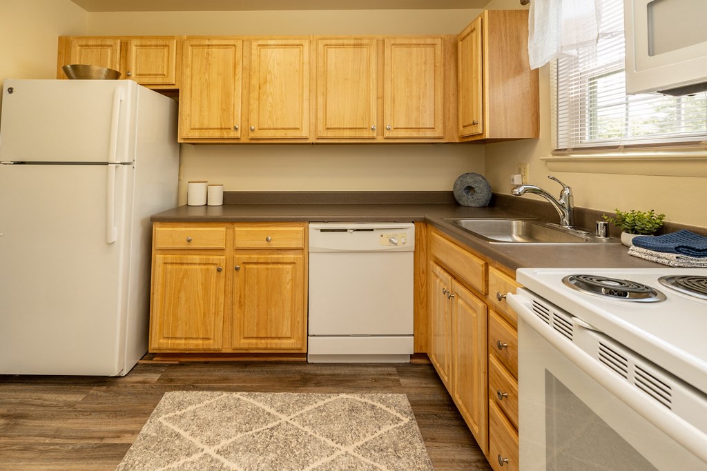 Kitchen with white appliances at Seven Oaks Townhomes, Edgewood, MD