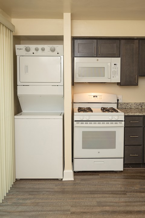 Washer and Dryer next to the kitchen at The Orchards at Severn Townhomes*, Severn, MD 21144