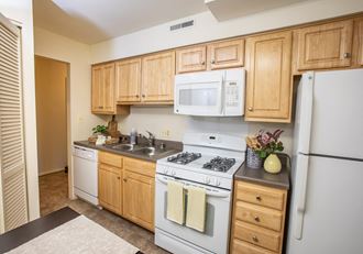 Eat in kitchen with ample cabinet storage  at Brittany Apartments, Baltimore, MD, 21208