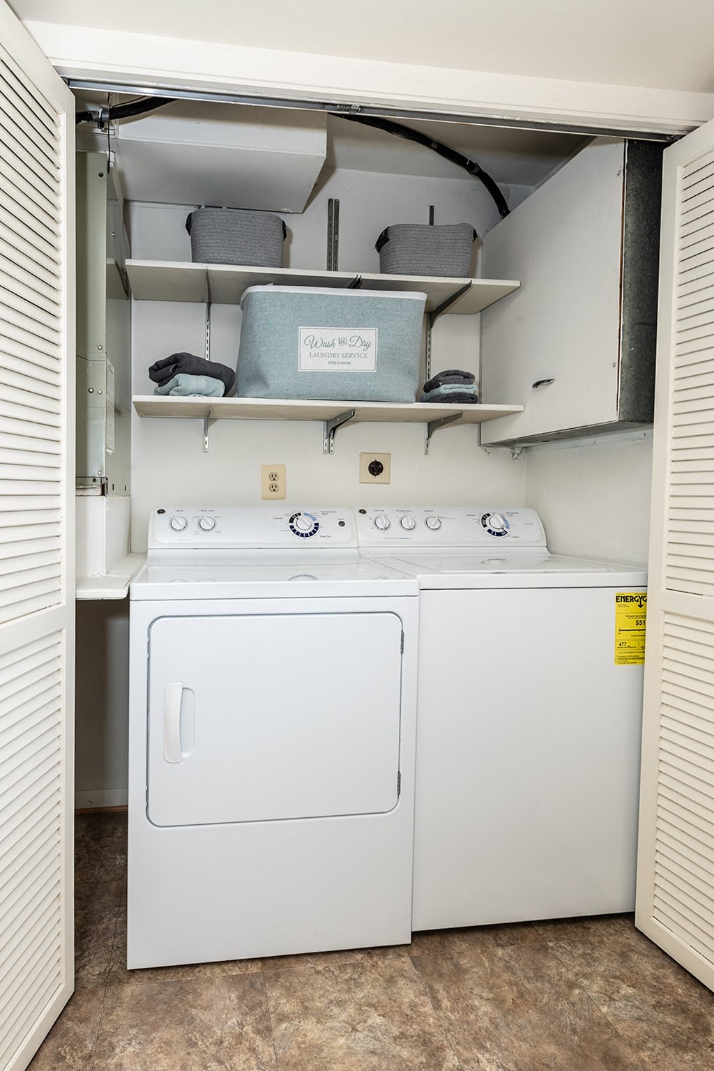 a washer and dryer are located in the laundry room at Chapel Valley Townhomes, Baltimore, MD 21236