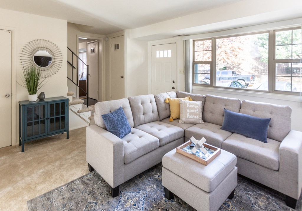 Carpeted bright living room at The Orchards at Severn Townhomes*, Severn