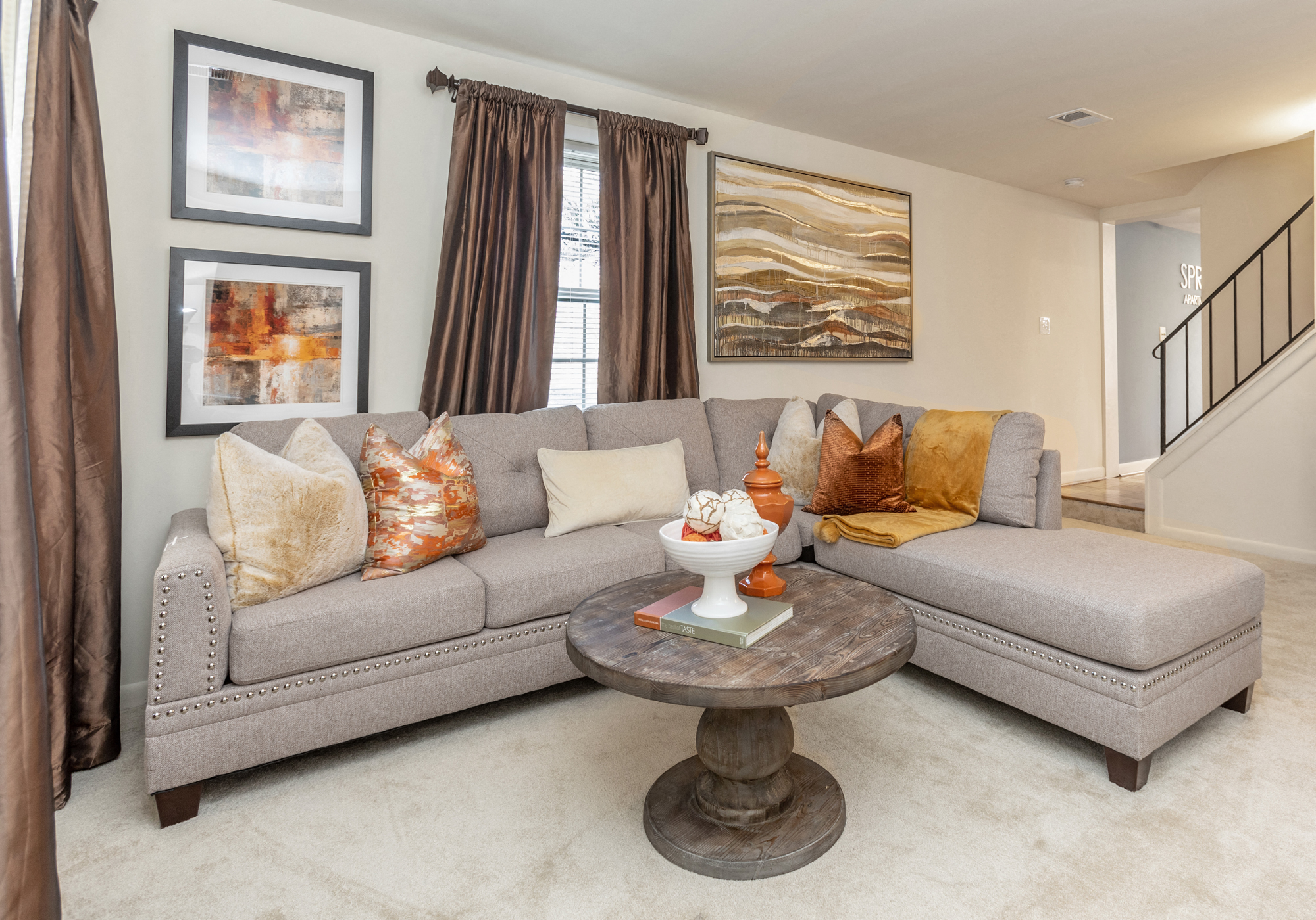 Spacious and bright Spring Hill Townhome living room at Spring Hill Apartments & Townhomes, Maryland, 21234