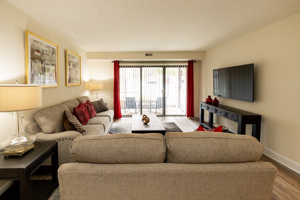 Living room with a couch and a tv at Ivy Hall Apartments*, Towson, MD 21204