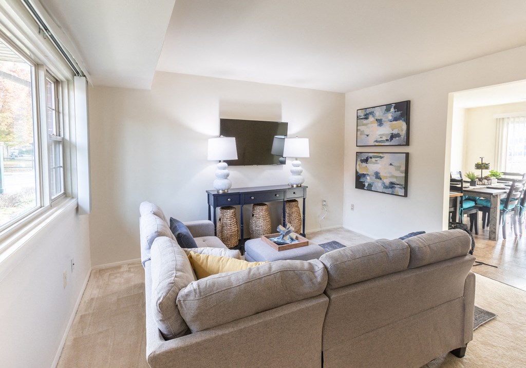 Carpeted bright living room at The Orchards at Severn Townhomes*, Severn Maryland