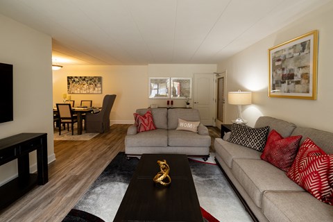 Living room with two couches and a coffee table at Ivy Hall Apartments*, Towson, Maryland.