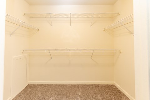 a spacious walk in closet at the enclave at Carlson Woods Townhomes, Baltimore, MD