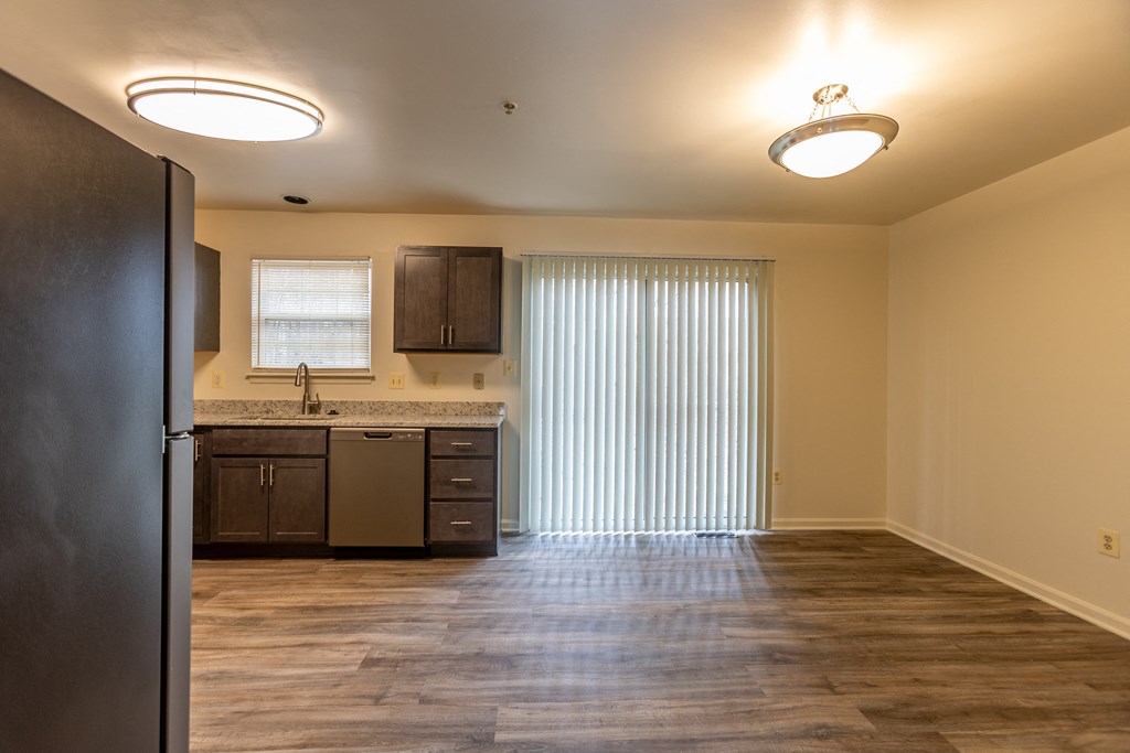 a kitchen and living room at Carlson Woods Townhomes, Baltimore, MD