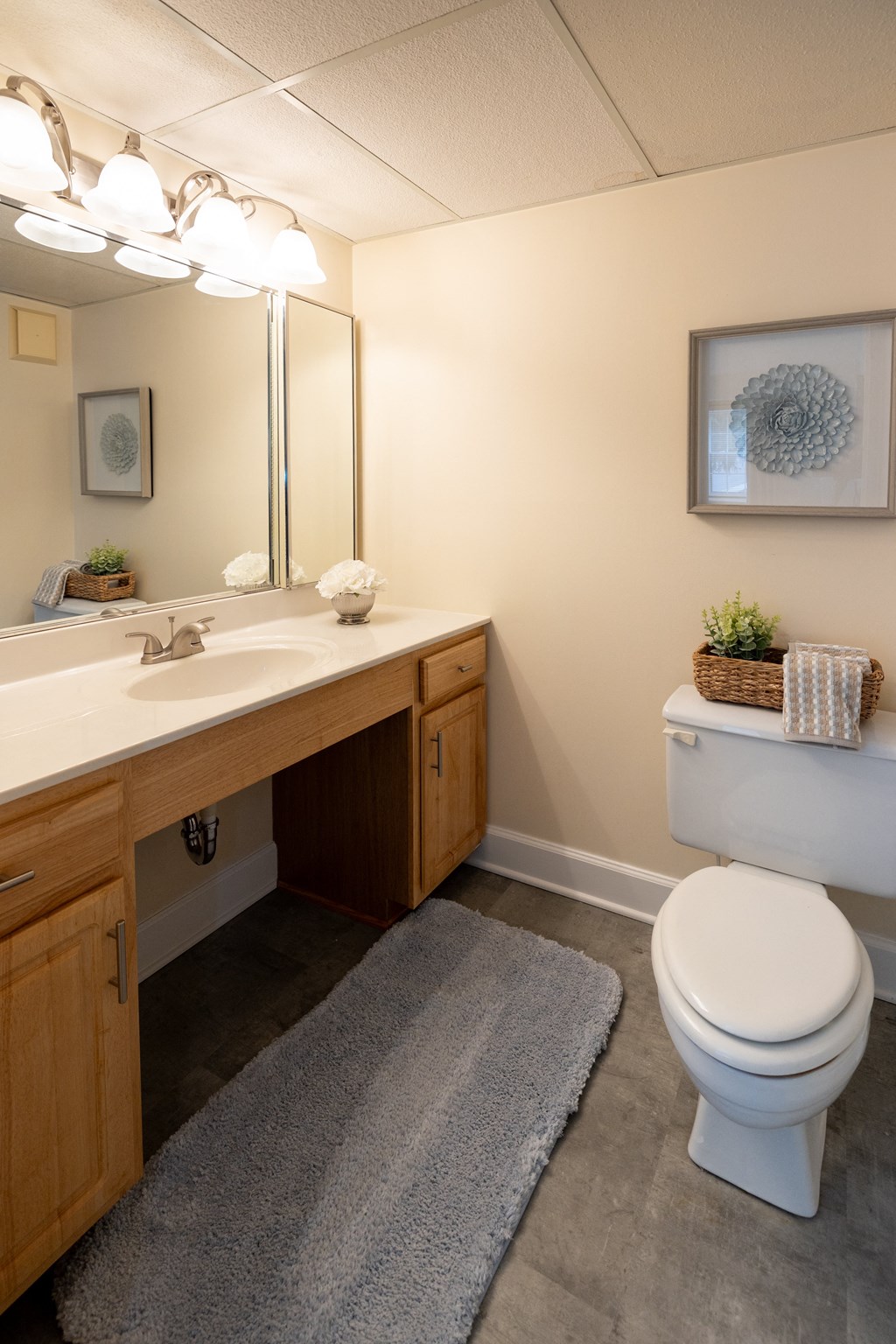 Bathroom with a toilet and a sink at Ivy Hall Apartments*, Towson, MD 21204.