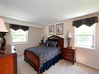 Large master bedroom with a ton of natural light and closet space