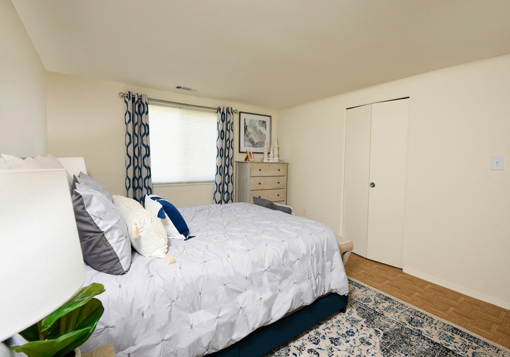 Large master bedroom with ample closet space at Winston Apartments, Baltimore