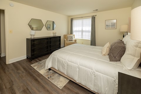 Master Bedroom Bed at The Brittany Apartments, Pikesville, MD