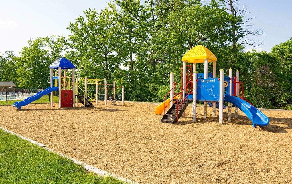 Playground with two slides and a swing set at Fairbrook Park, Baltimore