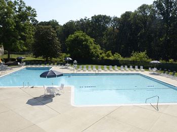 Lounging by the Pool at Woodridge Apartments, Maryland 21133