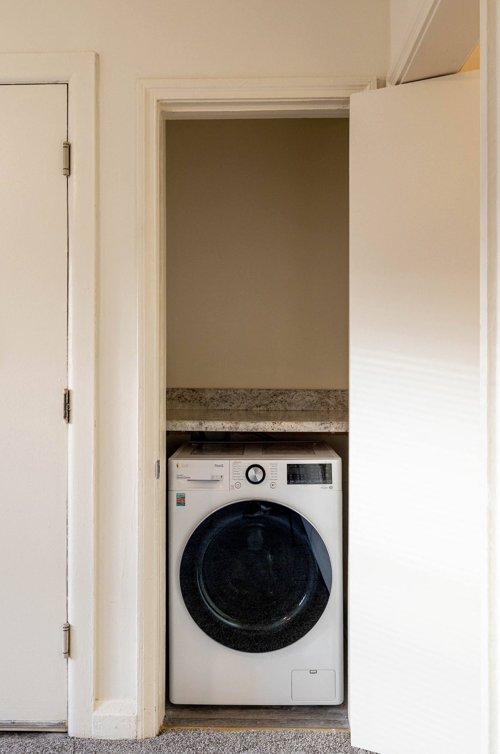 Small laundry room with a washer and dryer at Loch Bend Apartments, Baltimore, MD, 21234