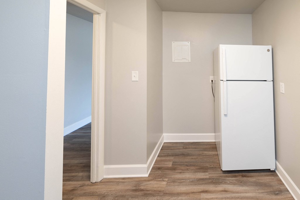 White refrigerator in a nook at McDonogh Village Apartments & Townhomes, Randallstown