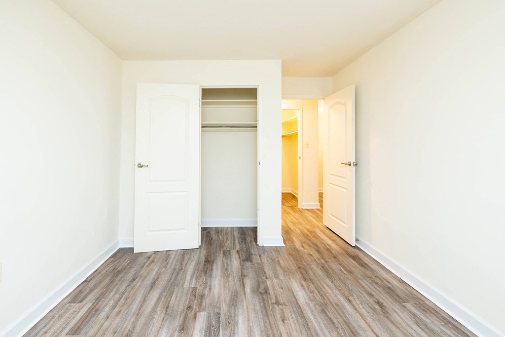Bedroom with white walls at Seminary Roundtop Apartments, Lutherville, Maryland, 21093