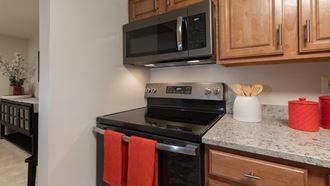 Microwave and Stove at Cromwell Valley Apartments, Towson, MD - Photo Gallery 5