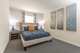 Large master bedroom with a lot of closet space at Lawyers Hill Apartments - Photo Gallery 4