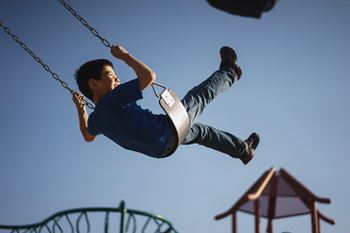 a boy on a swing