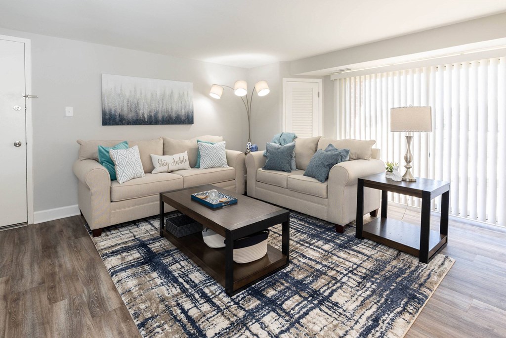 A living room with two couches and a coffee table at Fairbrook Park, Baltimore