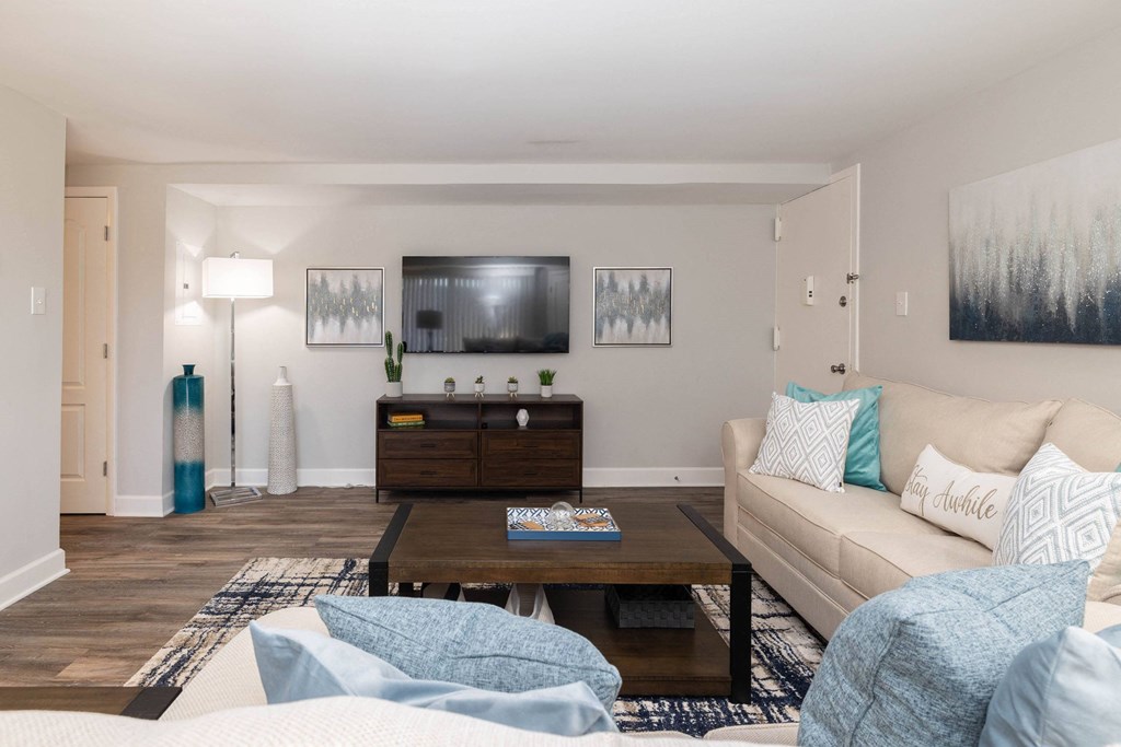 A living room with a couch and a coffee table at Fairbrook Park, Maryland