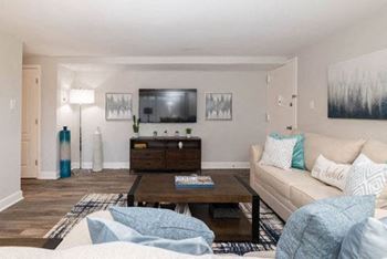 A living room with couches and a coffee table at Fairbrook Park, Maryland