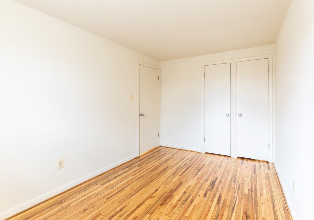 First bedroom with hardwood floors at Foxridge Townhomes, Baltimore Maryland