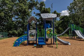 Playground with slides and monkey bars at Security Park Apartments*, Windsor Mill