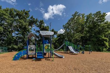 Playground with slides and monkey bars at Security Park Apartments*, Windsor Mill