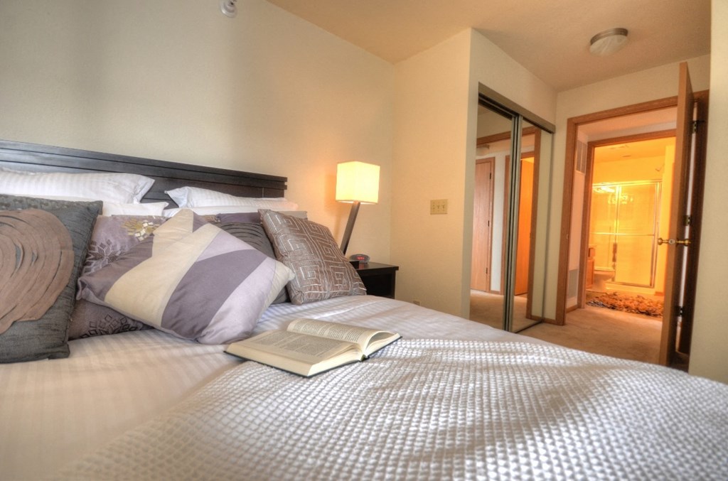 a bedroom with a bed