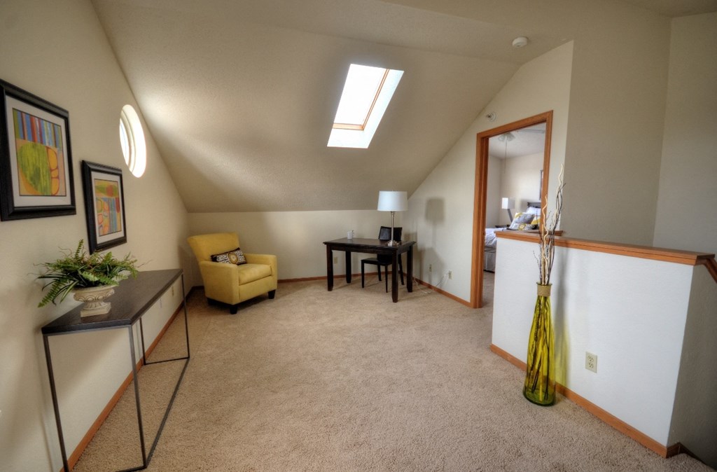 Loft area and a door to a bedroom