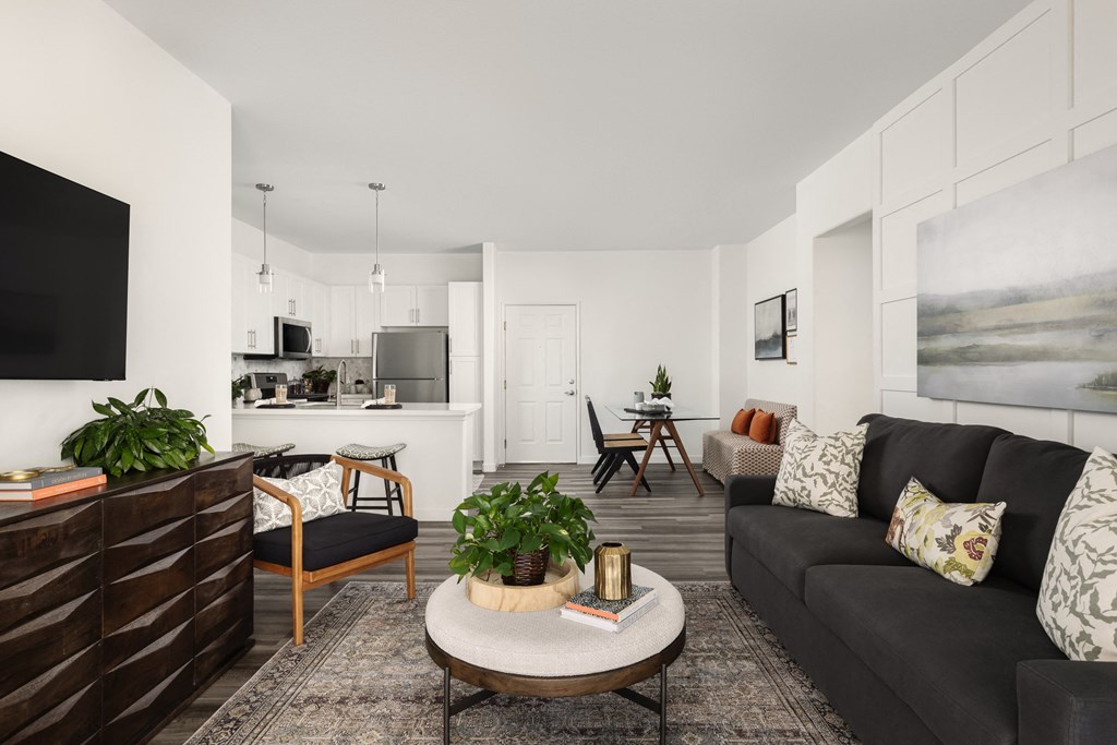 Open concept apartments open up to living and dining areas at City Lights at Town Center Apartments in Aliso Viejo