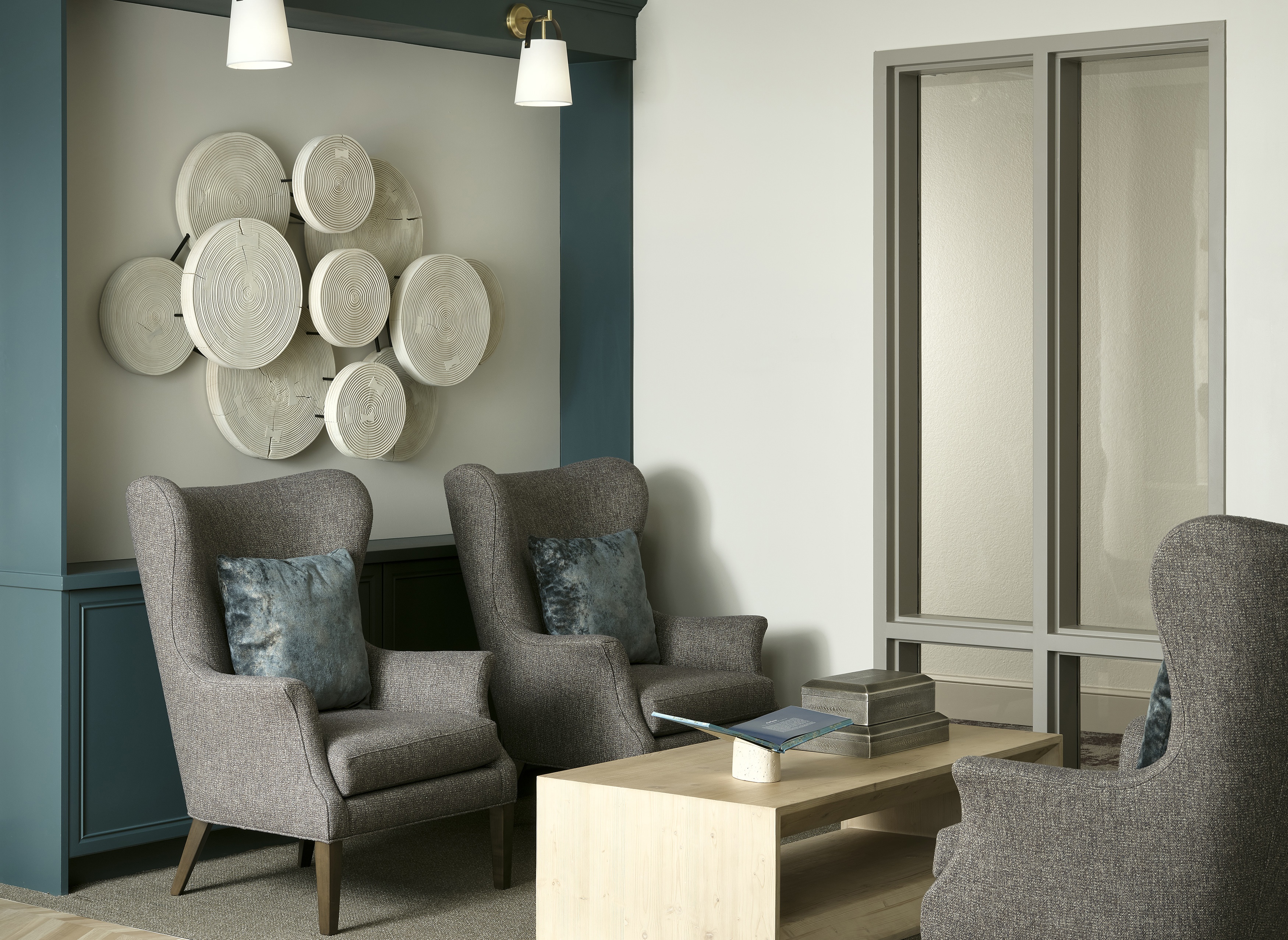 Clubroom style seating amenity with space to socialize at The Sophia in Englewood.