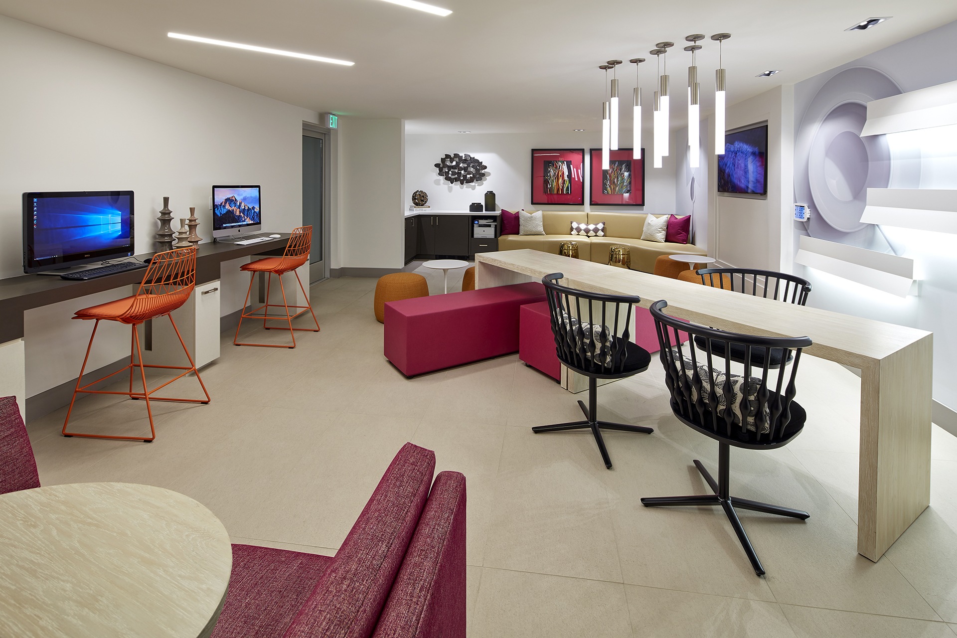 A modern living room with a television and a bar area.