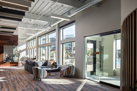 Modern office seating cowork amenity at Compass Meridian Apartments in Englewood.