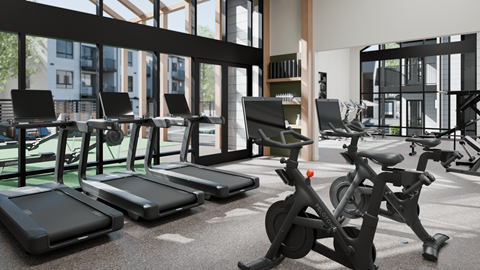 A fitness center amenity with cardio machines at Bloom at Portola in Livermore.