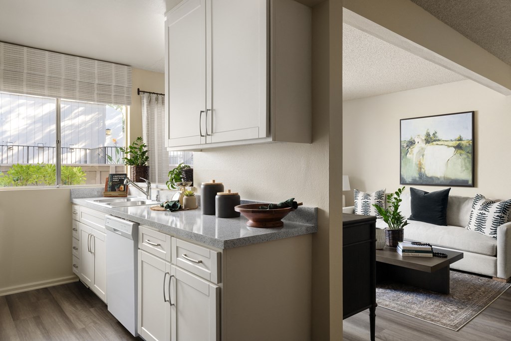 View of kitchen and living area at Cerritos Apartments
