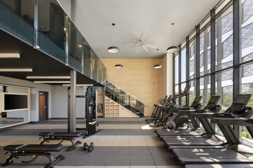Fitness center with cardio machines at Sixth & Jackson apartments in San Jose.