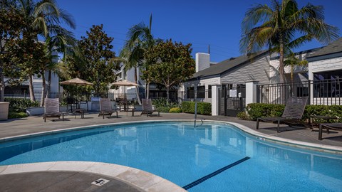 Outdoor pool amenity at Crystal Springs apartments in Fountain Valley.