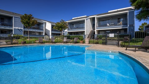 Outdoor pool amenity at Crystal Springs apartments in Fountain Valley.