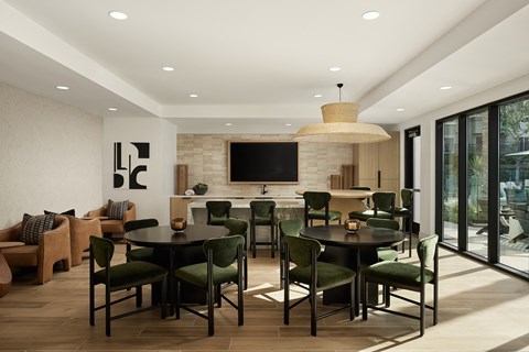 Kitchen seating and resident lounge at City Lights at Town Center Apartments in Aliso Viejo
