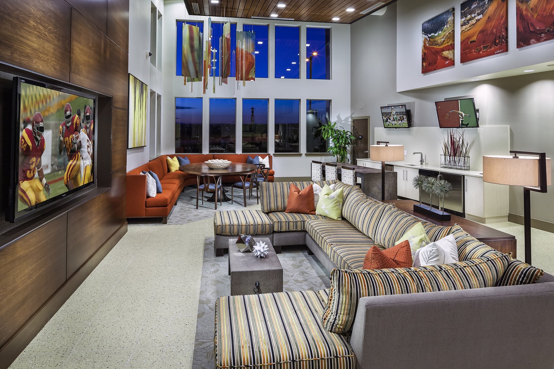 A living room with a grey couch and a coffee table.