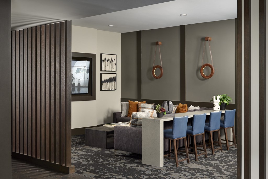 Resident lounge theater amenity at Zenith Meridian apartments in Englewood.