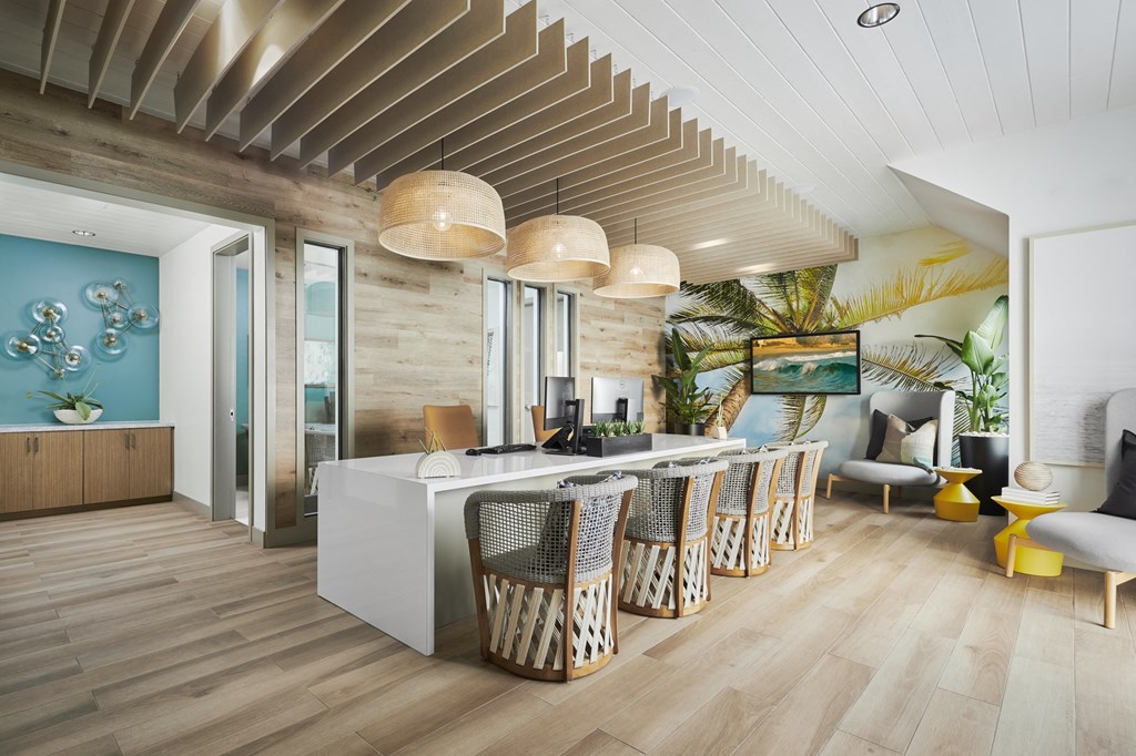 Community seating indoor co-work area at Seaside at Laguna Heights apartments in Laguna Niguel.