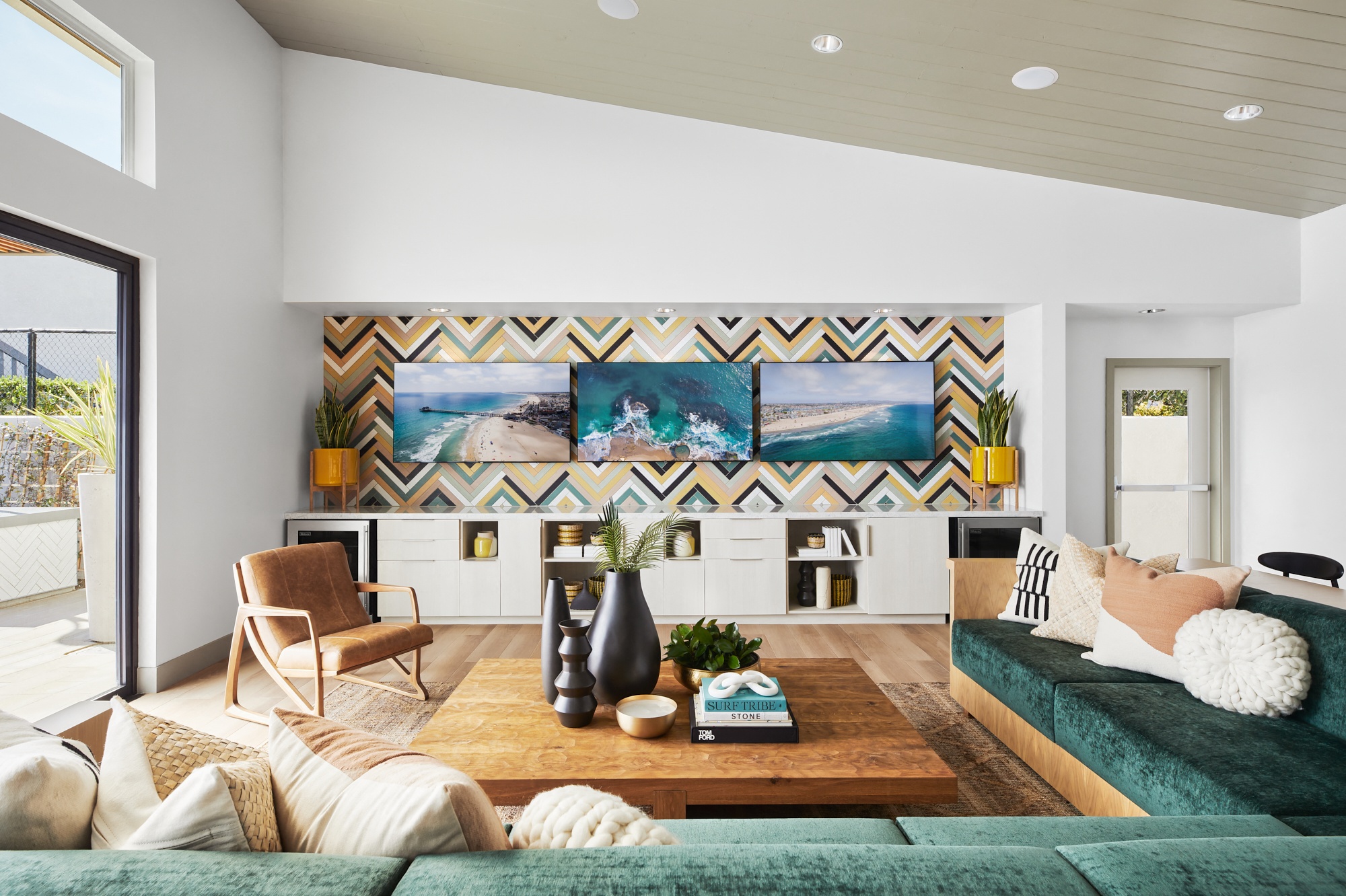 a living room with a blue couch and a coffee table